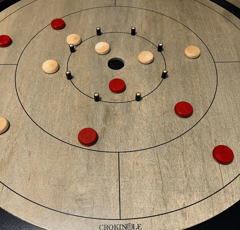Crokinole board in play